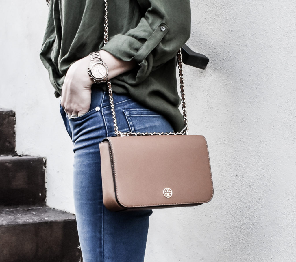 Erin from Cathedrals and Cafes models a Tory Burch shoulder bag in tan with Diane Gilman DG2 Jeans