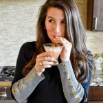 Erin from Cathedrals and Cafes sips a Galentine's Day Cocktail
