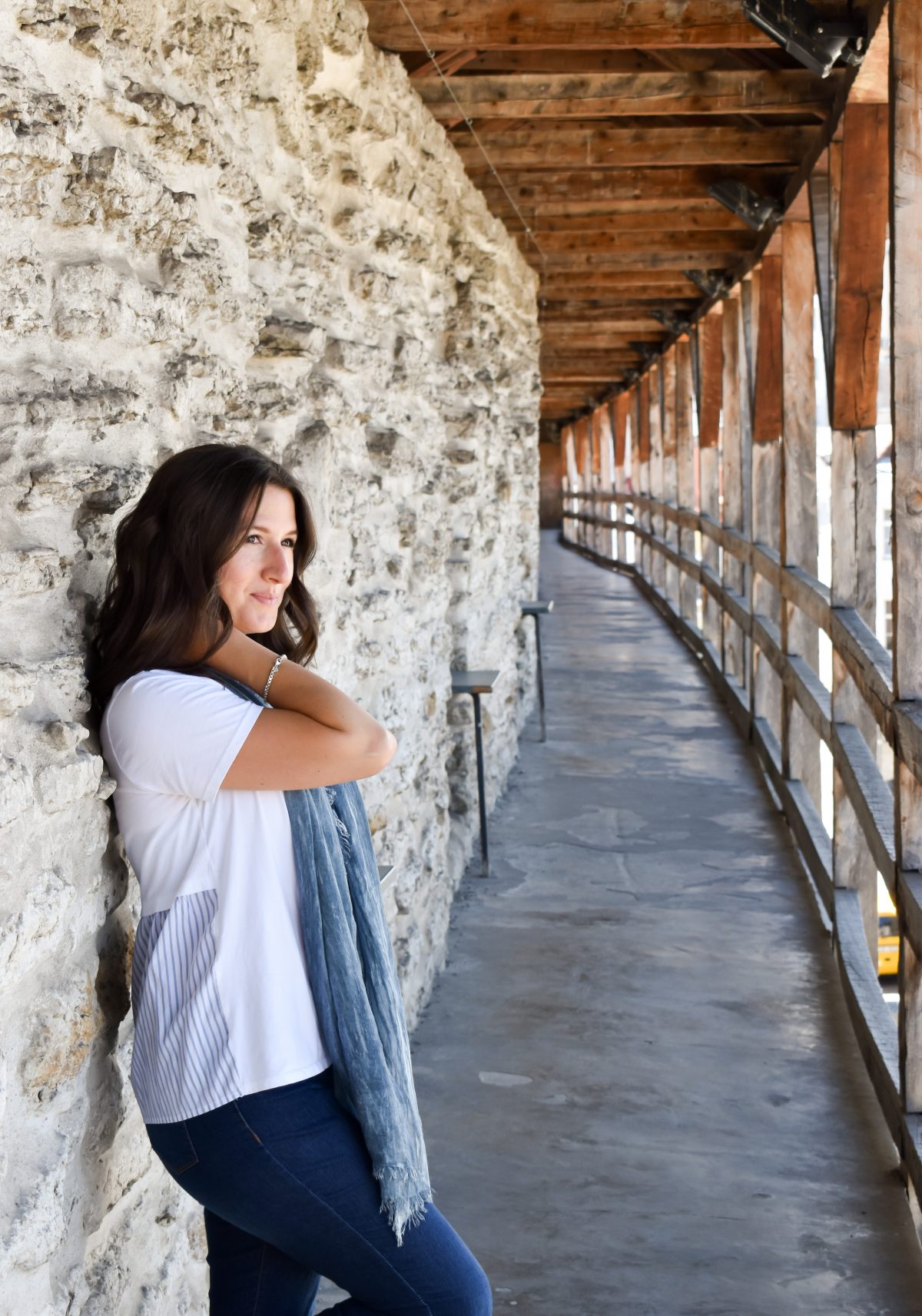 Erin walks the ancient medieval wall in Tallinn.